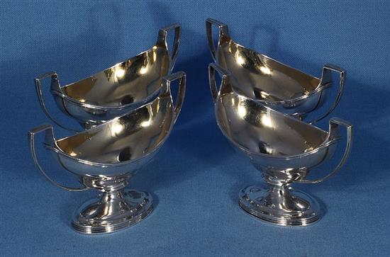 A set of four George III silver salts, by Robert & David Hennell, Length 135mm, weight 12.8oz/400grms.